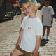 Konges Slojd bambino Era Tee OCS Bianco sporco / camicia di servizio del bagnino