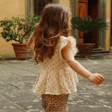 Konges Slojd Top per bambina con volant Coco Carta Rosa